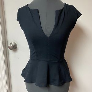 Bebe black peplum top